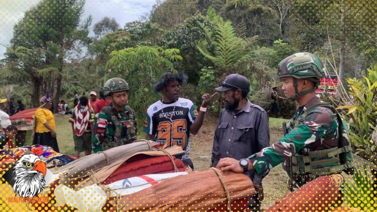 Satgas Yonif 521/DY Turut Hadir Acara Pameran Buah Merah di Distrik Kelila